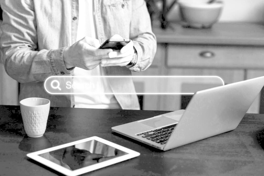 Person using a search engine, proving the importance of SEO best practices.
